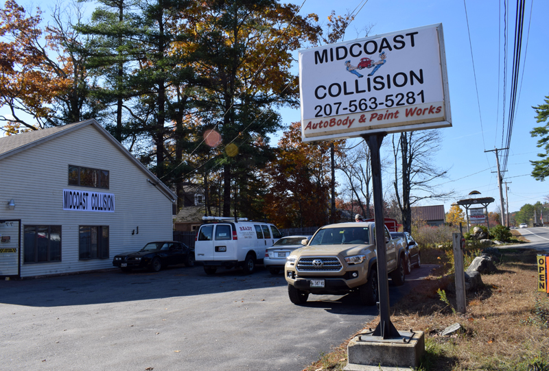 New signs advertise Midcoast Collision, formerly Scarborough's Collision, at 77 Biscay Road in Damariscotta. Dennis Hoppe, owner of the neighboring Quick Turn Auto Repair and Towing, has purchased the business. (Evan Houk photo)