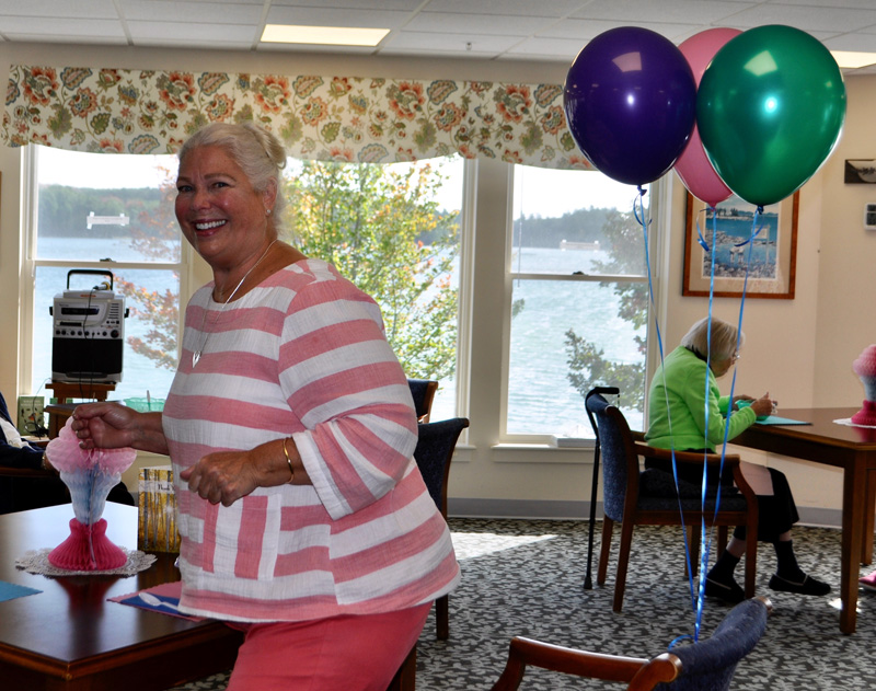 Lynn Norgang is all smiles in her duties at Lincoln Home.