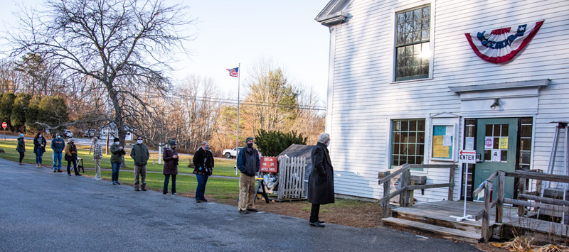 Voters wait in line outside Edgecomb town hall Tuesday, Nov. 3. Despite the chilly morning, more than 25 people were in line before the doors opened at 8 a.m. (Bisi Cameron Yee photo)