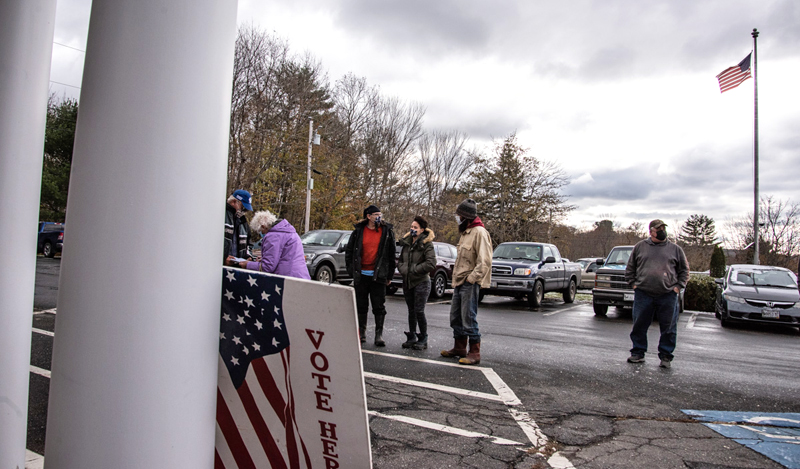 Voters wait in line at the Waldoboro municipal building Tuesday, Nov. 3. Waldoboro had 10 questions on a local ballot, including a much-debated referendum regarding the sale of A.D. Gray School. (Bisi Cameron Yee photo)