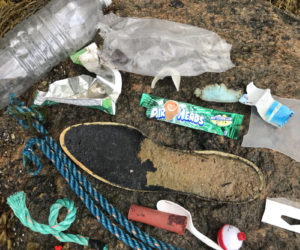 Trash fished out of the Damariscotta River in South Bristol. (Photo courtesy Lee Emmons)
