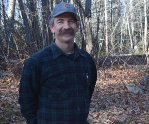 Bristol woodworker Darin Carlucci outside his home on Dec. 15. After 17 years as an instructor at The Carpenter's Boat Shop, Carlucci's current project is building unique wooden structures for a bird of prey exhibit at a New Hampshire science center. (Evan Houk photo)