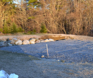 The site of a future greenhouse behind Great Salt Bay Community School in Damariscotta on Tuesday, Dec. 15. Margaret Coleman, agriculture coordinator at the school, expects the greenhouse to be up by fall 2021. (Evan Houk photo)