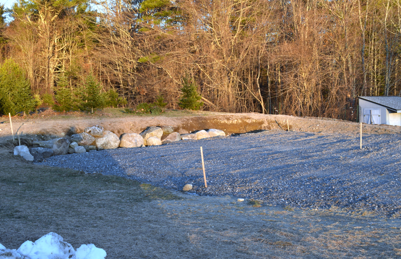 The site of a future greenhouse behind Great Salt Bay Community School in Damariscotta on Tuesday, Dec. 15. Margaret Coleman, agriculture coordinator at the school, expects the greenhouse to be up by fall 2021. (Evan Houk photo)