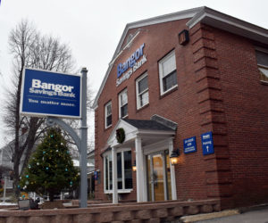 Bangor Savings Bank signs are up at the former Damariscotta Bank and Trust branch in downtown Damariscotta. Bangor Savings will remodel the branch starting in fall 2021. (Evan Houk photo)