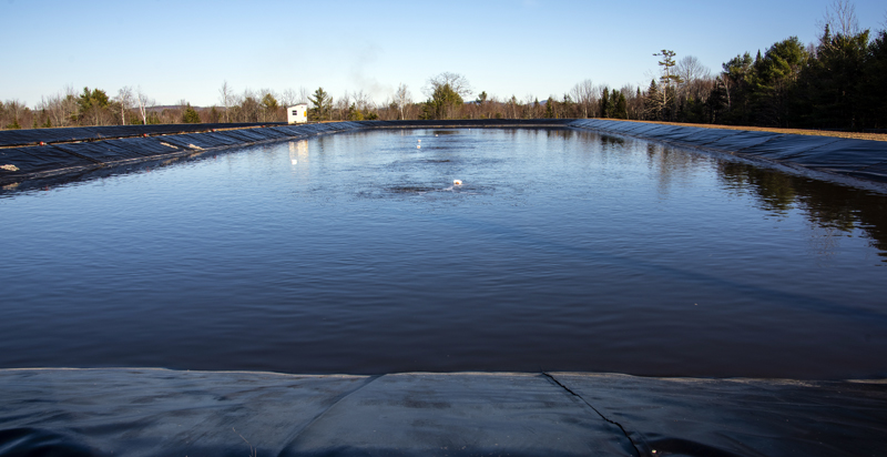 Large aerators mix wastewater in the treatment lagoon at the Waldoboro Utility District on Dec. 3. Keeping the wastewater in motion allows bacteria to find and break down waste materials, ultimately leaving potable water that is then sprayed onto surrounding fields. (Bisi Cameron Yee photo)