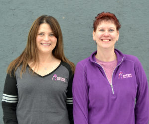 Julie Greenleaf (left) and Sarah Caton care for local animals through Caton's business, All Paws Pet Sitting. All Paws is celebrating five years in business.