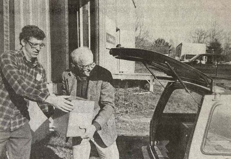 Chris Roberts (left) helps Mark Biscoe load his car with copies of his then-new book, "'No Pluckier Set of Men Anywhere': The Story of Ships and Men in Damariscotta and Newcastle, Maine" in a photo from the Nov. 17, 1994 edition of The Lincoln County News. The "Waldoboro Wanderings" columnist died Saturday, Dec. 19 at the age of 84.