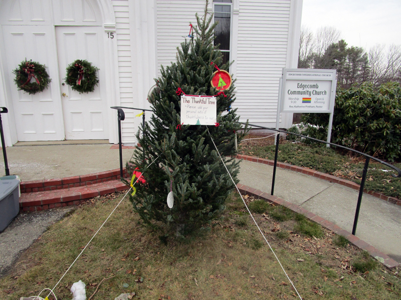 The Edgecomb Community Church Thankful Tree is ready for community members to add messages, ornaments, and photographs to express thankfulness.