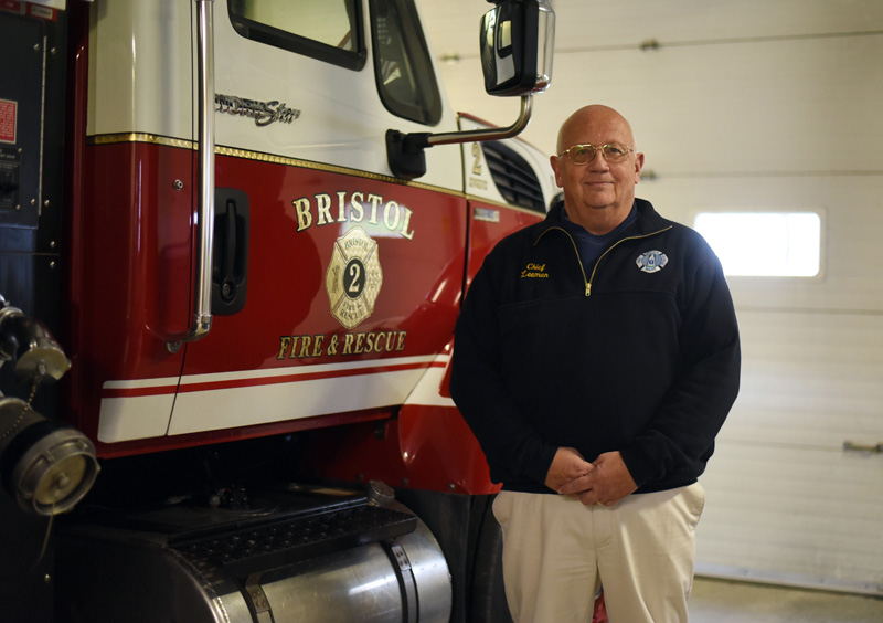 Bristol Fire Chief Paul Leeman Jr. stands next to a fire truck in the Round Pond station Oct. 24, 2018. Leeman will retire at the end of April. (LCN file photo)