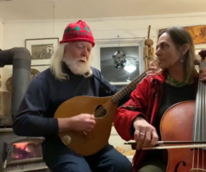 The duo Buxbaum and Dunn performs the original song "Eat the Rich" during Damariscotta Open Mic's Peaceful New Beginnings concert. Brian Dunn plays an octave mandolin he made himself and Laura Buxbaum plays the cello. (Screenshot by Evan Houk)