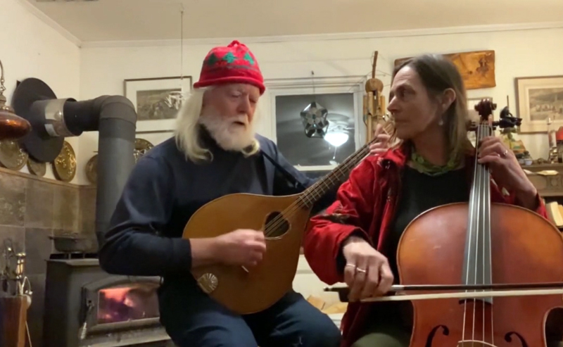 The duo Buxbaum and Dunn performs the original song "Eat the Rich" during Damariscotta Open Mic's Peaceful New Beginnings concert. Brian Dunn plays an octave mandolin he made himself and Laura Buxbaum plays the cello. (Screenshot by Evan Houk)