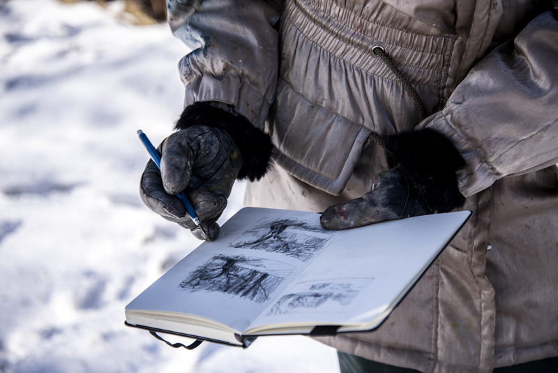 Roberta Goschke shares her sketchbook in Waldoboro on Sunday, Jan. 10. Goschke often starts her plein-air paintings as small sketches. (Bisi Cameron Yee photo)