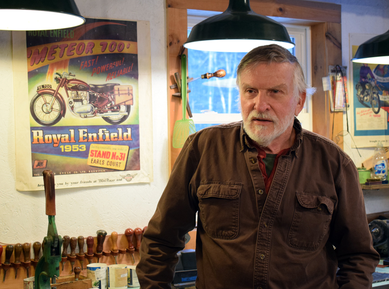Narragansett Leathers owner Alan McKinnon stands in his home workshop in Newcastle on Jan. 7. A motorcycle enthusiast, he owns three of the machines and rides nearly every day. (Evan Houk photo)