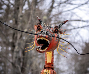A metal dragon greets visitors to Nate Nicholls' recycled art garden in Waldoboro on Feb. 5. (Bisi Cameron Yee photo)