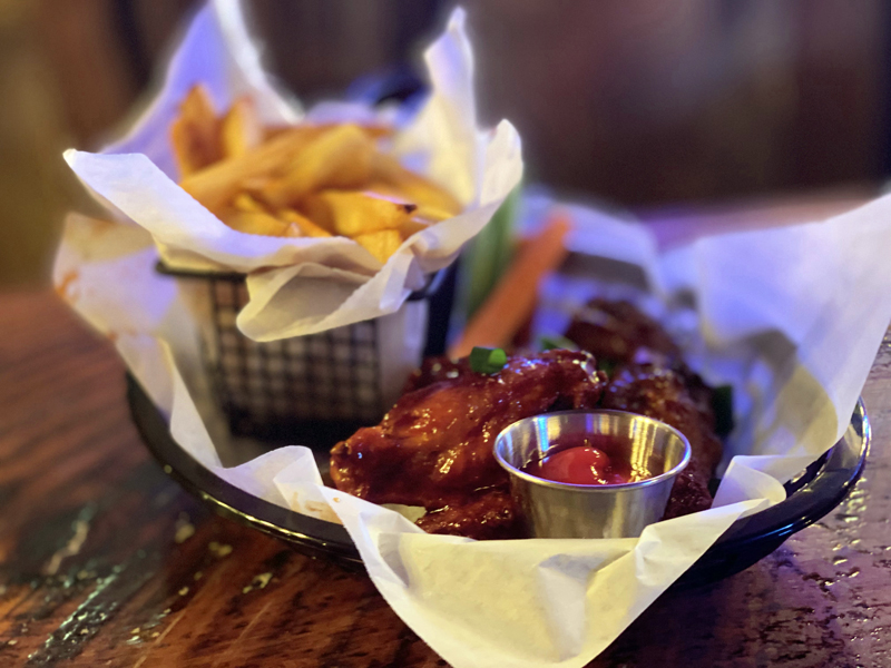 Chicken wings with fries. (Photo courtesy Michael Dickson)
