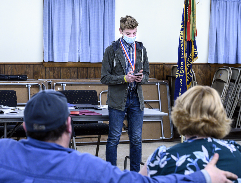 E.J. Hunt reads his prize-winning essay while his parents watch from the audience at the Veterans of Foreign Wars post in Waldoboro on Thursday, March 11. (Bisi Cameron Yee photo)