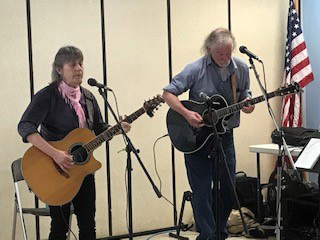 Sylvia Tavares and John Couch at a open mic in Damariscotta. (Photo courtesy Marianne Pinkham)