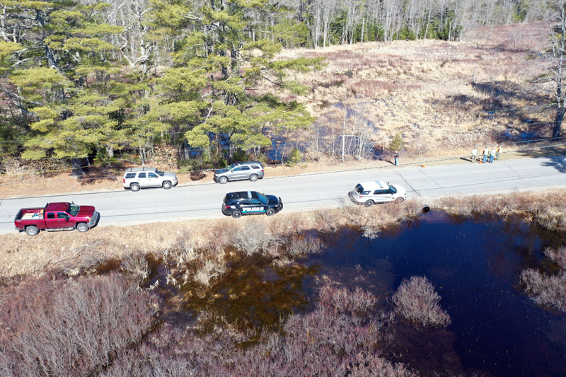 Authorities gather around a swamp off Back Meadow Road in Damariscotta during a search operation Saturday, April 3. (Photo courtesy HS Drone Works, Newcastle)