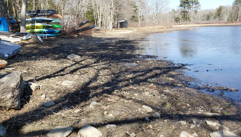 The shore of Damariscotta Lake near Moody's Island on March 23. Lakefront property owner Rebecca Waddell said the water level has come up in the past week from rain, but it is still 1 or 2 feet below its normal level. (Photo courtesy Rebecca Waddell)