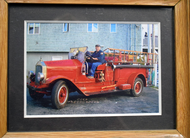 Newcastle Fire Chief Clayton V. Huntley Jr. at the wheel of a 1928 Maxim fire engine. The engine originally belonged to the Taniscot Engine Company and Huntley worked to find it and get it back. (Evan Houk photo)
