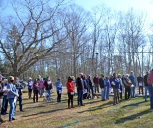 Westport Island voters attend a special town meeting on the grounds between the community church and the historic town hall, Saturday, April 10. (Charlotte Boynton photo)