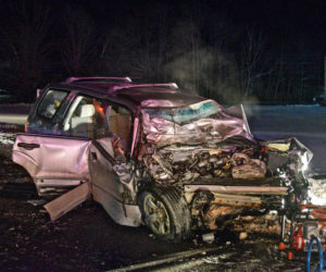 The wreck of a 2007 Subaru Forester after a head-on collision with a flatbed tow truck on Route 1 in Wiscasset, Wednesday, Feb. 10. Firefighters had to extricate the Subaru's driver. (Hailey Bryant photo)