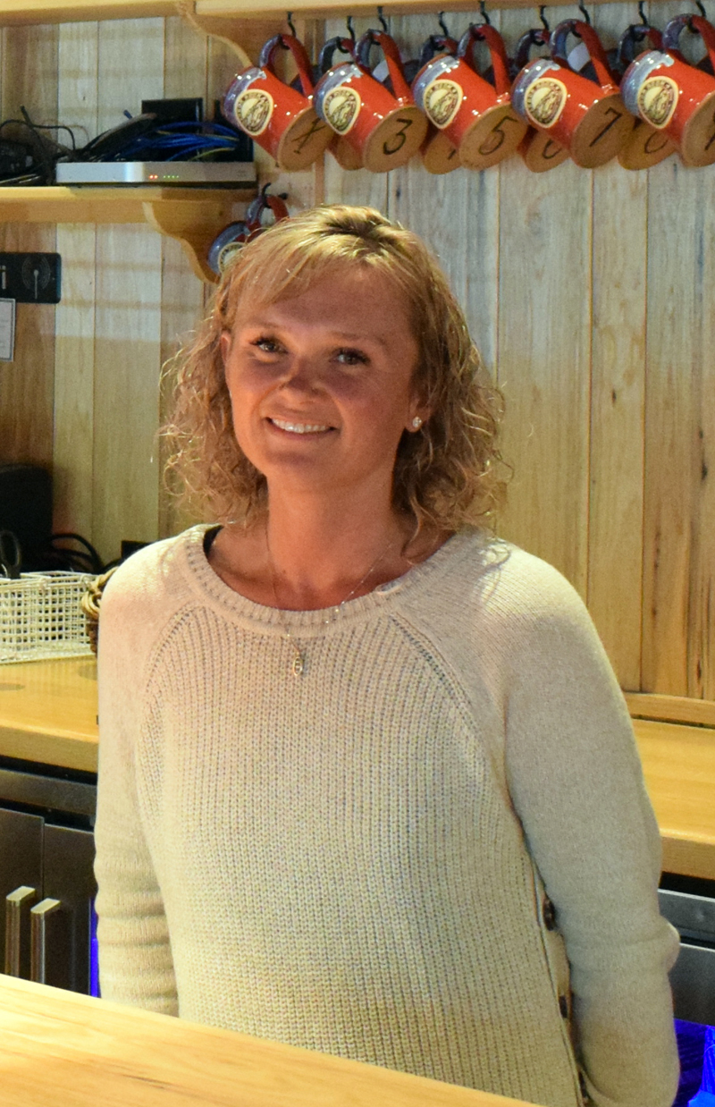 Cortney Geyer stands behind the bar of The Harbor Room restaurant. Prior to becoming the restaurant's owner, Geyer previously worked as a server and manager under prior ownership. (Evan Houk photo, LCN file)