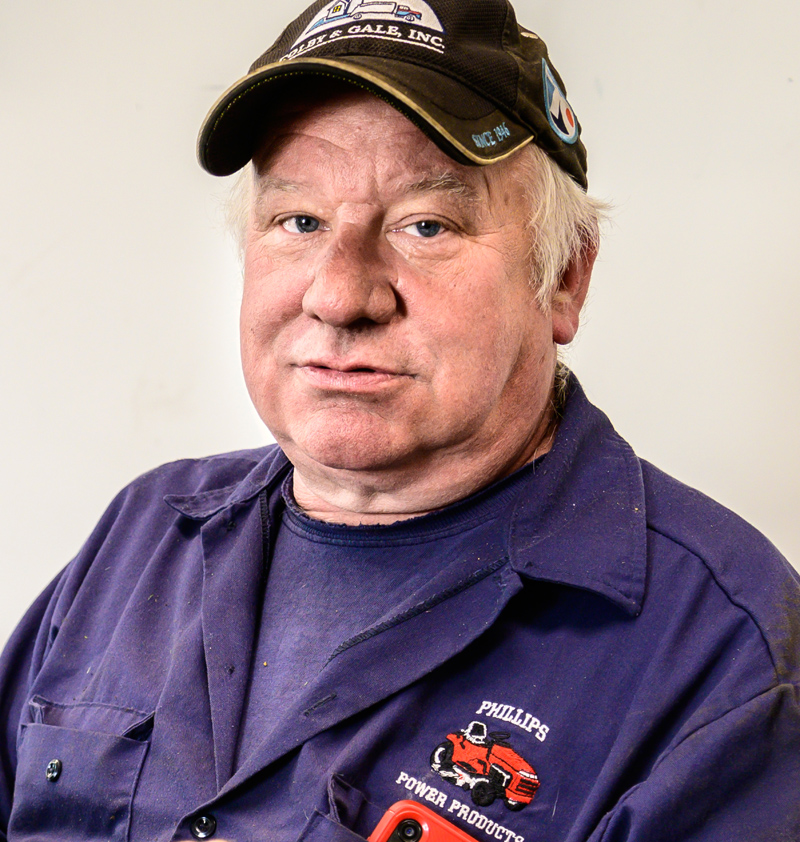 Jay Verney poses for a photo at Phillips Power Products, a division of Colby & Gale, in Damariscotta on Friday, May 14. For 40 years, Verney sold and repaired tractors and mowers during the mowing season and switched to fuel delivery for the winter. (Bisi Cameron Yee photo)