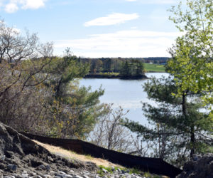 A view of an island in Great Salt Bay from Newcastle's sand storage lot on Mills Road. Central Maine Power Co. plans to build a temporary "floating road" from the lot to the island. (Evan Houk photo)