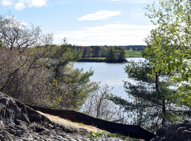 A view of an island in Great Salt Bay from Newcastle's sand storage lot on Mills Road. Central Maine Power Co. plans to build a temporary "floating road" from the lot to the island. (Evan Houk photo)