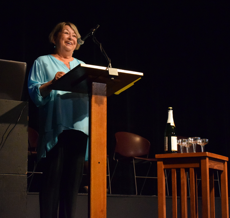 Central Lincoln County Adult Education Director Pam Sperry introduces the 2020-2021 graduates during a ceremony at Lincoln Theater on Tuesday, June 8. The graduates celebrated with a song, personalized poems from Sperry, a toast, and a punch and cake reception. (Evan Houk photo)