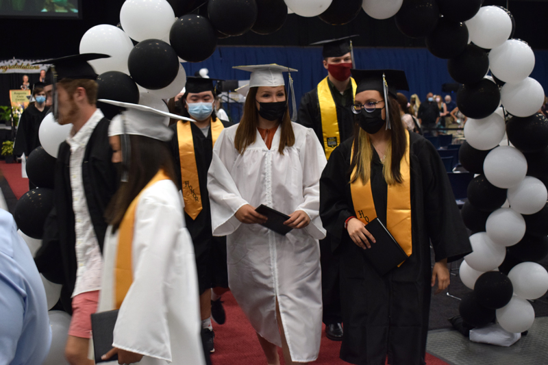 Lincoln Academy graduates file out of the Augusta Civic Center after graduating on Friday, June 4. The school was able to hold a more traditional graduation ceremony this year, with the whole class graduating together, after holding outdoor "mini-graduations" last year. (Evan Houk photo)