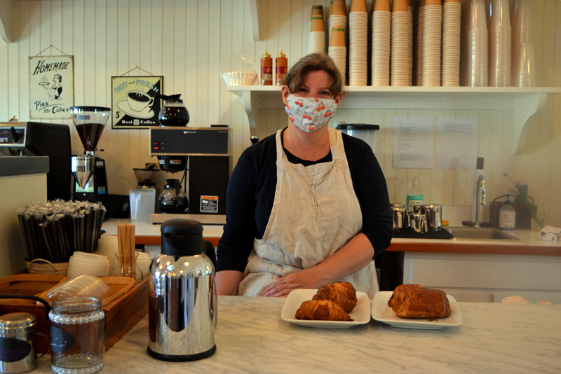 Jennifer Keegan stands behind the counter at Kneaded Provisions, a market specializing in homemade baked goods on Rutherford Island in South Bristol. (Nettie Hoagland photo)