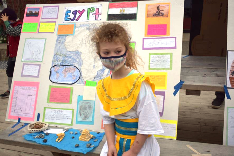 Damariscotta Montessori School student Lucia Sandrock waits to talk about her research about Egypt.