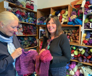Pine Tree Yarns manager Linda Perry (left) and owner Elaine Eskesen in the shop on Main Street in Damariscotta.