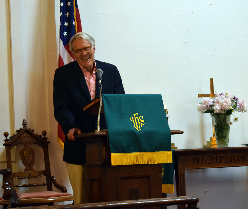 The Rev. Bobby Ives reminisces about his time as pastor of the Round Pond United Methodist Church during its final service on Sunday, June 27. Approximately 43 people attended the final service in the 168-year-old building known as the White Church. (Evan Houk photo)