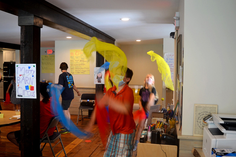 Camper juggles with scarves during the Under the Big Top camp at the Merry Barn in Edgecomb on Friday, July 16. (Nettie Hoagland photo)