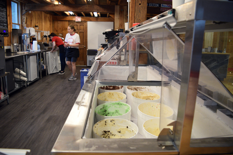 Ice cream tubs fill a cooler at Blanchard's Creamery in Edgecomb. The ice cream, which is made in-house, is slow churned in small batches, making it thicker and creamier than most mass-produced supermarket ice cream brands. (Nate Poole photo)