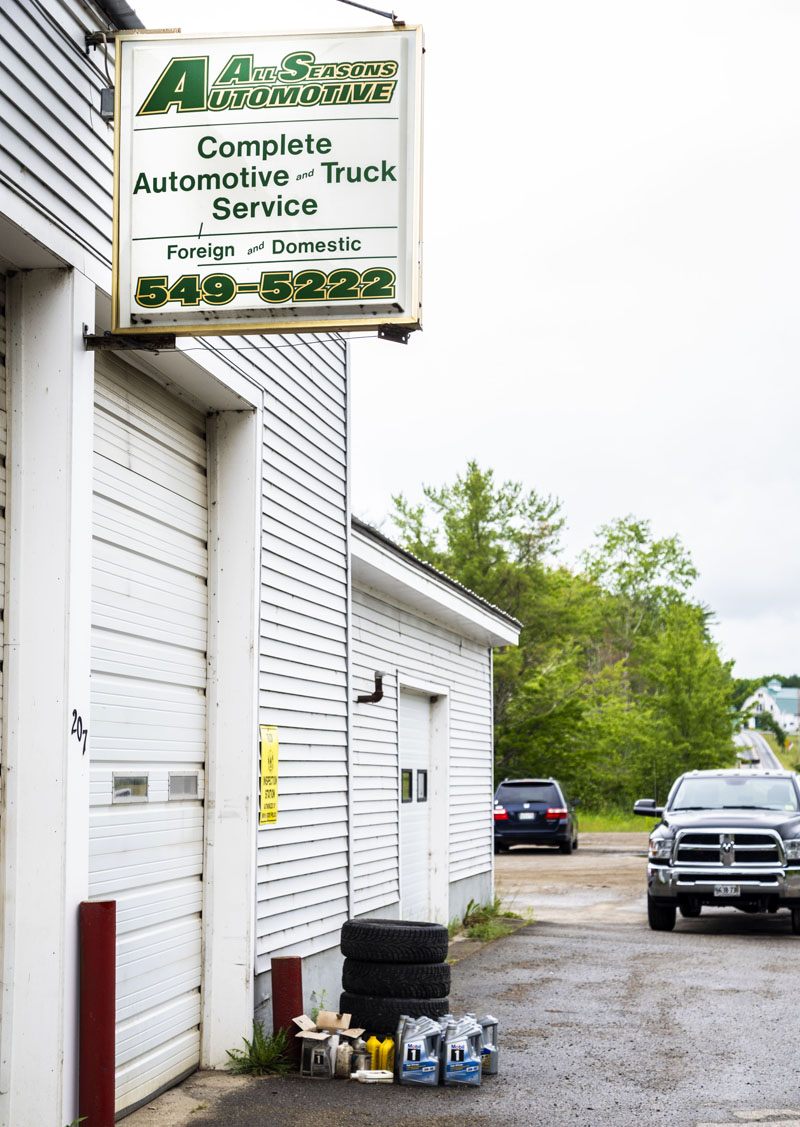 The All Seasons Automotive sign hangs above the four-bay garage in Jefferson on Friday, June 25. The shop will close its doors on Friday, July 2. (Bisi Cameron Yee photo)