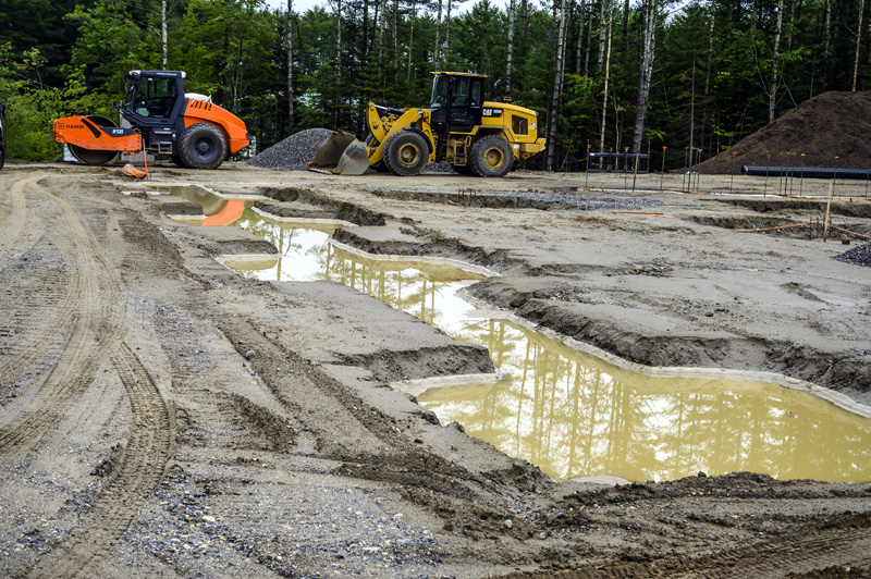 Construction vehicles are on hand to move dirt and gravel at the site of American Unagi's future aquaculture facility in Waldoboro on July 19. The innovative structure will allow elvers, or baby eels, to be raised to full size in a land-based facility. (Bisi Cameron Yee photo)