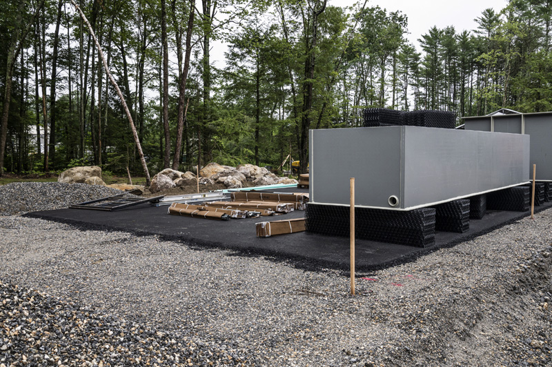 Large crates of material for American Unagi's recirculating aquaculture systems are beginning to be unpacked in Waldoboro on July 19. The system was designed by Dutch firm Aquaculture Consultant Engineering. (Bisi Cameron Yee photo)