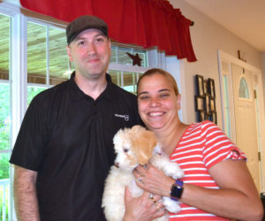 U.S. Air Force Lt. Col. Greg Ward, his wife Kristyna, and Stella, the family's new dog, enjoy a brief vacation in Nobleboro. Ward returned home from Kuwait on July 4 after a nearly 14-month deployment. (Charlotte Boynton photo)