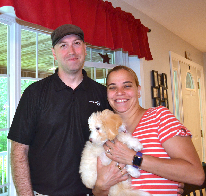 U.S. Air Force Lt. Col. Greg Ward, his wife Kristyna, and Stella, the family's new dog, enjoy a brief vacation in Nobleboro. Ward returned home from Kuwait on July 4 after a nearly 14-month deployment. (Charlotte Boynton photo)