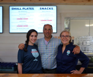 From left: Sarah Gross, Andrew Gross, and Elizabeth Gross own the Maine Tasting Center in Wiscasset. (Nettie Hoagland photo)