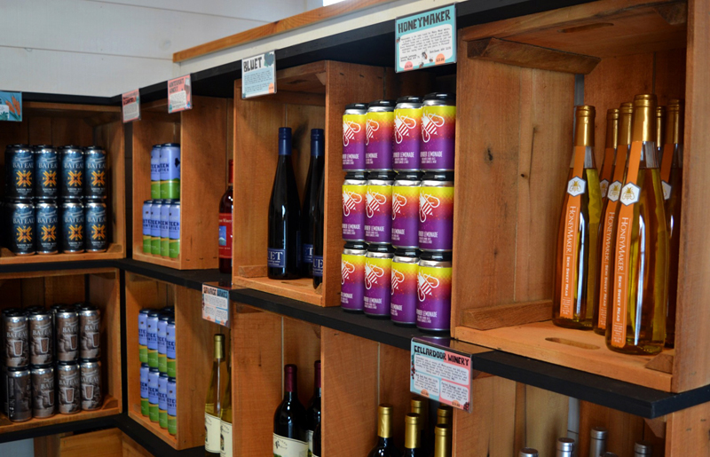 Some of the Maine-made wine, beer, and cider available inside the tasting room of the Maine Tasting Center in Wiscasset. (Nettie Hoagland photo)