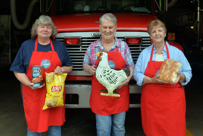 Bremen Fire Department Auxilliary members Kathy Teele, Bonnie Poland and Joan Teele are gearing up for their annual chicken BBQ to be held on Sat., July 24. (Paula Roberts photo)