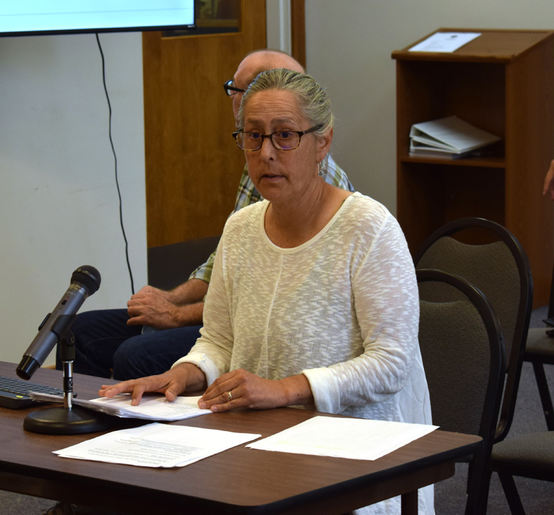 Mary Anne Moisan, of the Damariscotta Region Safety and Accessibility Collaborative, presents the results of a 16-question bicycle survey to the Damariscotta Board of Selectmen on Wednesday, Aug. 4. The survey indicated a desire of cyclists for wider shoulders, more dedicated bicycle routes, and more bike racks in town. (Evan Houk photo)