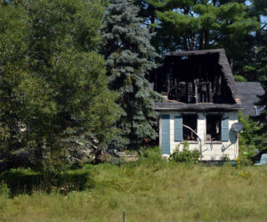 A fire severely damaged a two-story farmhouse at 736 East River Road in Whitefield during the early hours of Thursday, July 29. (Paula Roberts photo)