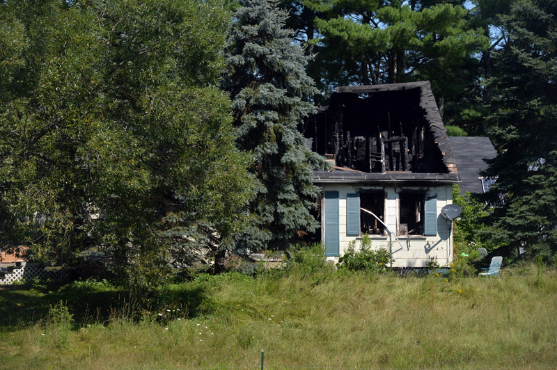 A fire severely damaged a two-story farmhouse at 736 East River Road in Whitefield during the early hours of Thursday, July 29. (Paula Roberts photo)